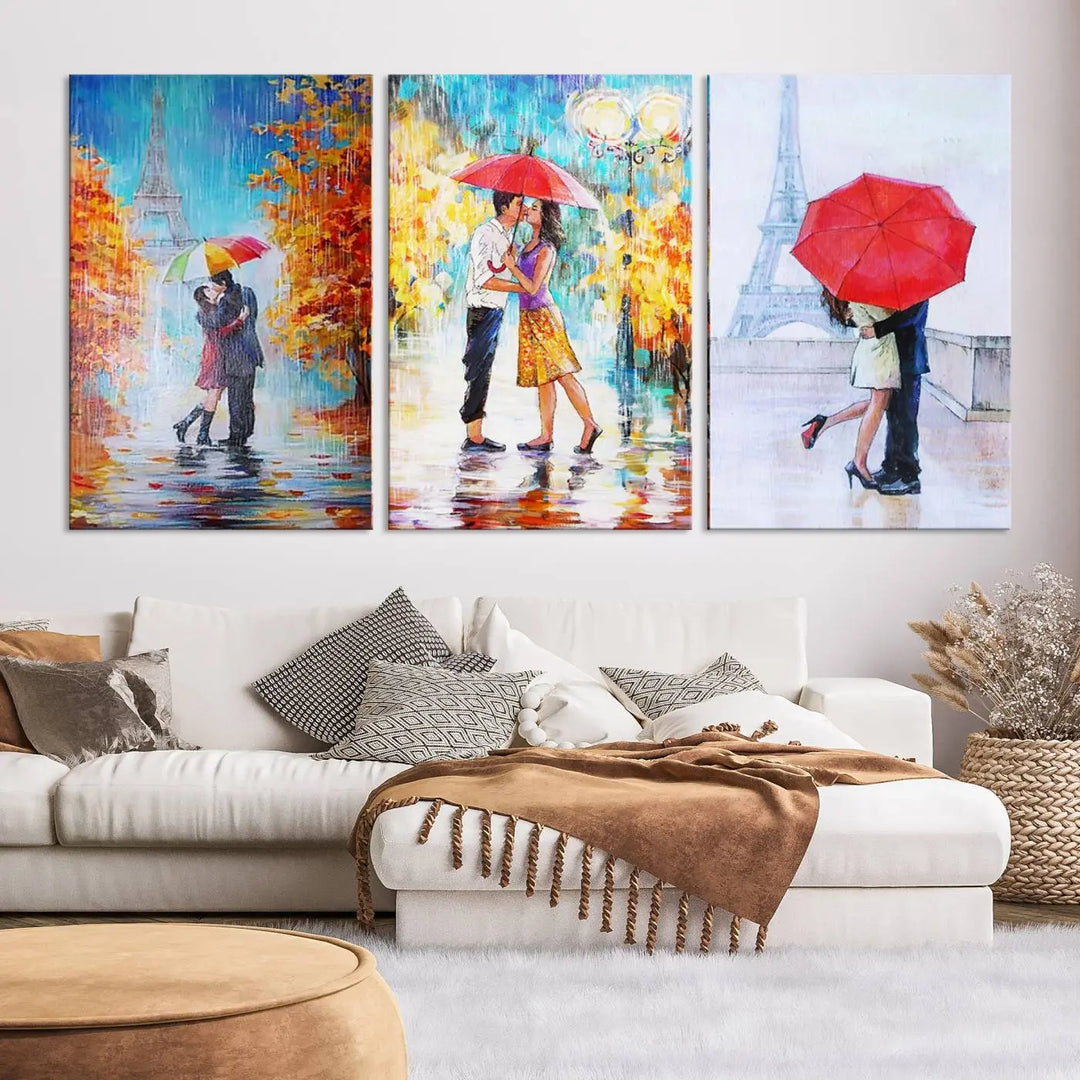 A triptych of the "Love in Paris Wall Art Canvas Print" showcases a couple with an umbrella in romantic settings. This artwork is crafted on museum-quality canvas and features a UV-protective coating for peace of mind. It also comes with the added convenience of free shipping.