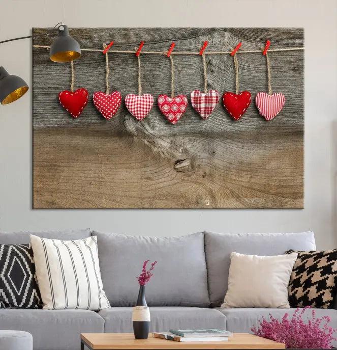 The "Love on the Wood Wall Art Canvas Print" enhances the modern living room with its hanging heart designs. The museum-quality canvases feature a UV-protective coating, ensuring their beauty lasts over time.