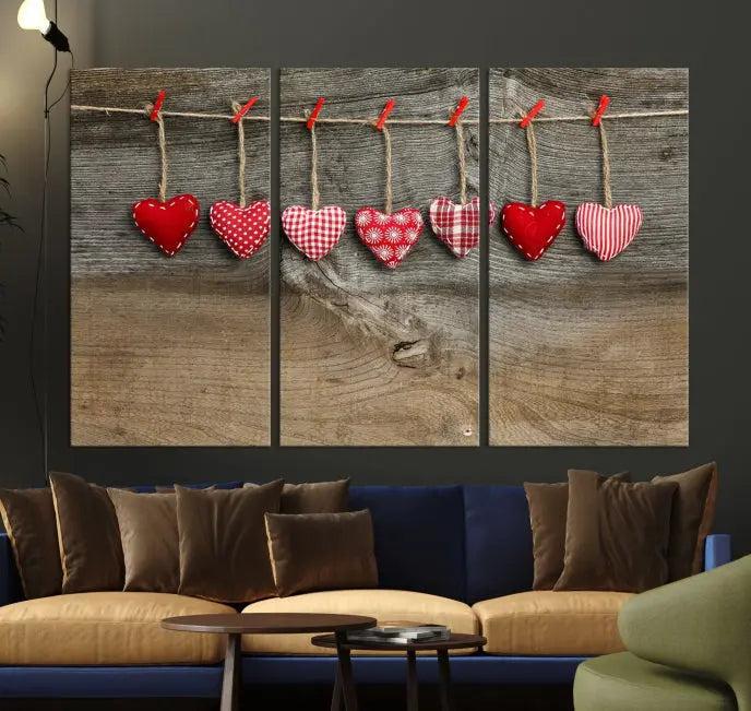 The "Love on the Wood Wall Art Canvas Print" enhances the modern living room with its hanging heart designs. The museum-quality canvases feature a UV-protective coating, ensuring their beauty lasts over time.