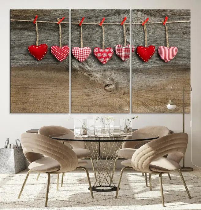 The "Love on the Wood Wall Art Canvas Print" enhances the modern living room with its hanging heart designs. The museum-quality canvases feature a UV-protective coating, ensuring their beauty lasts over time.