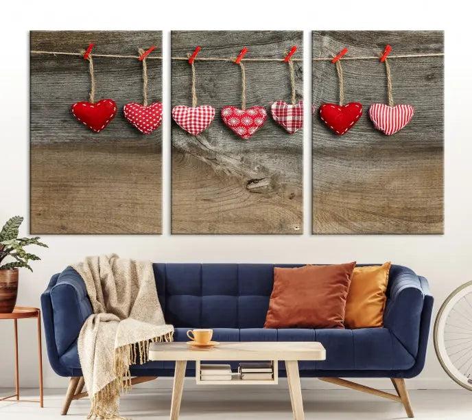 The "Love on the Wood Wall Art Canvas Print" enhances the modern living room with its hanging heart designs. The museum-quality canvases feature a UV-protective coating, ensuring their beauty lasts over time.