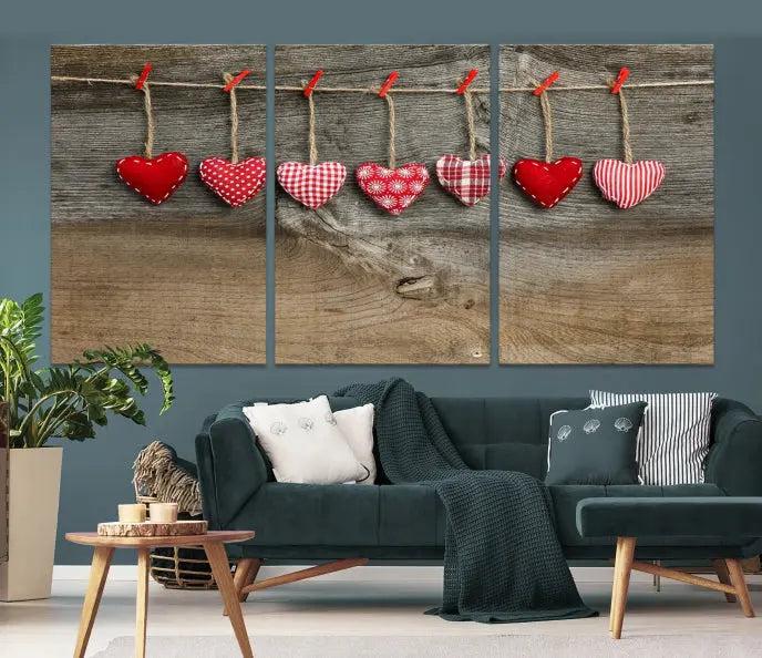 The "Love on the Wood Wall Art Canvas Print" enhances the modern living room with its hanging heart designs. The museum-quality canvases feature a UV-protective coating, ensuring their beauty lasts over time.