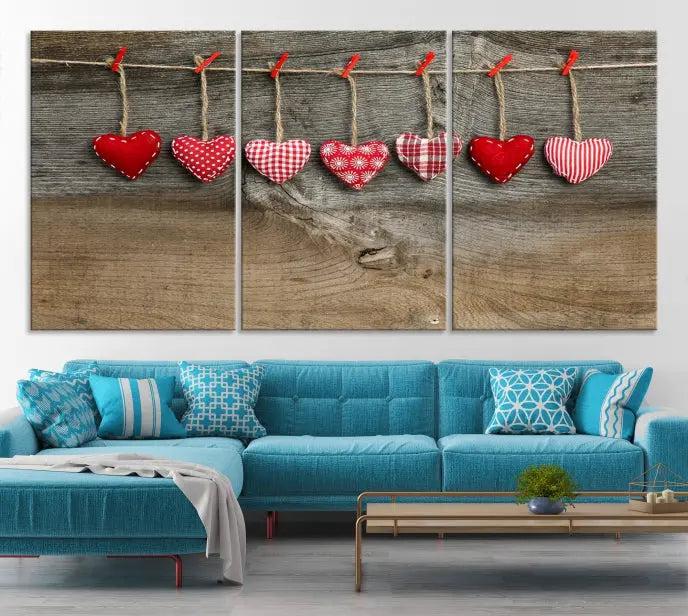 The "Love on the Wood Wall Art Canvas Print" enhances the modern living room with its hanging heart designs. The museum-quality canvases feature a UV-protective coating, ensuring their beauty lasts over time.