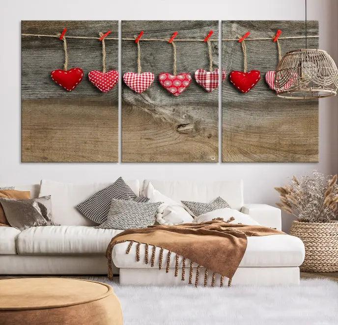 The "Love on the Wood Wall Art Canvas Print" enhances the modern living room with its hanging heart designs. The museum-quality canvases feature a UV-protective coating, ensuring their beauty lasts over time.