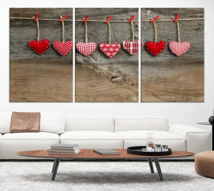 The "Love on the Wood Wall Art Canvas Print" enhances the modern living room with its hanging heart designs. The museum-quality canvases feature a UV-protective coating, ensuring their beauty lasts over time.