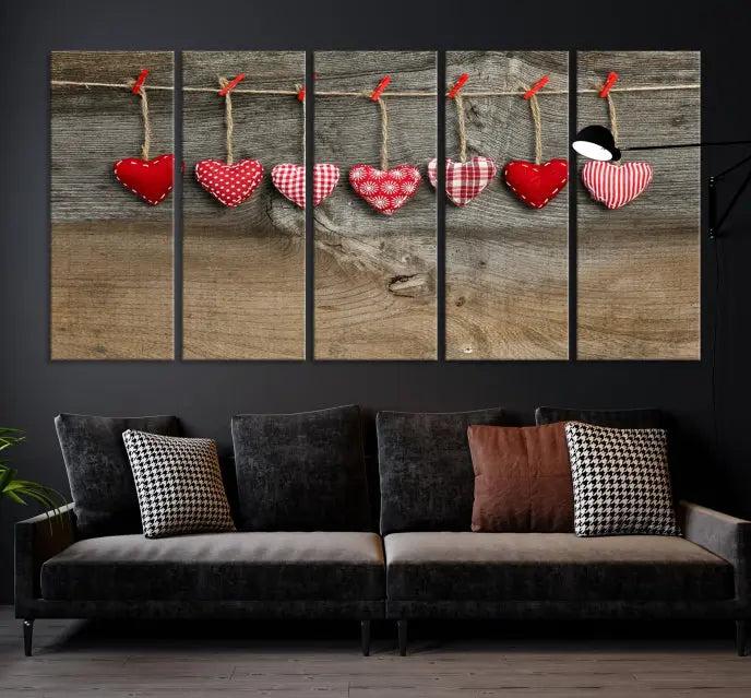 The "Love on the Wood Wall Art Canvas Print" enhances the modern living room with its hanging heart designs. The museum-quality canvases feature a UV-protective coating, ensuring their beauty lasts over time.