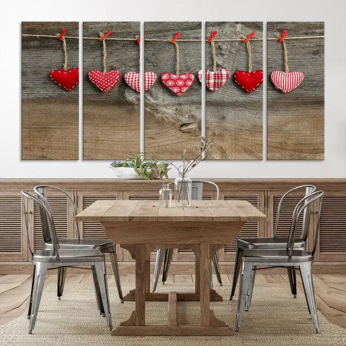 The "Love on the Wood Wall Art Canvas Print" enhances the modern living room with its hanging heart designs. The museum-quality canvases feature a UV-protective coating, ensuring their beauty lasts over time.