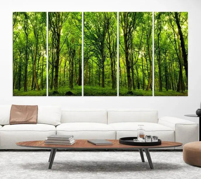 A modern living room features the Lush Green Forest Canvas Print—a 3-panel forest wall art—mounted above, creating an ideal retreat for nature lovers.