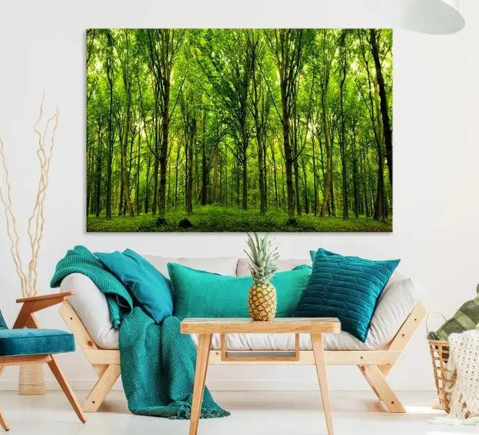 A modern living room features the Lush Green Forest Canvas Print—a 3-panel forest wall art—mounted above, creating an ideal retreat for nature lovers.