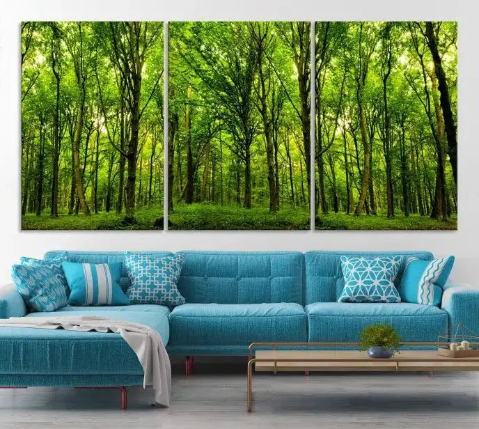 A modern living room features the Lush Green Forest Canvas Print—a 3-panel forest wall art—mounted above, creating an ideal retreat for nature lovers.