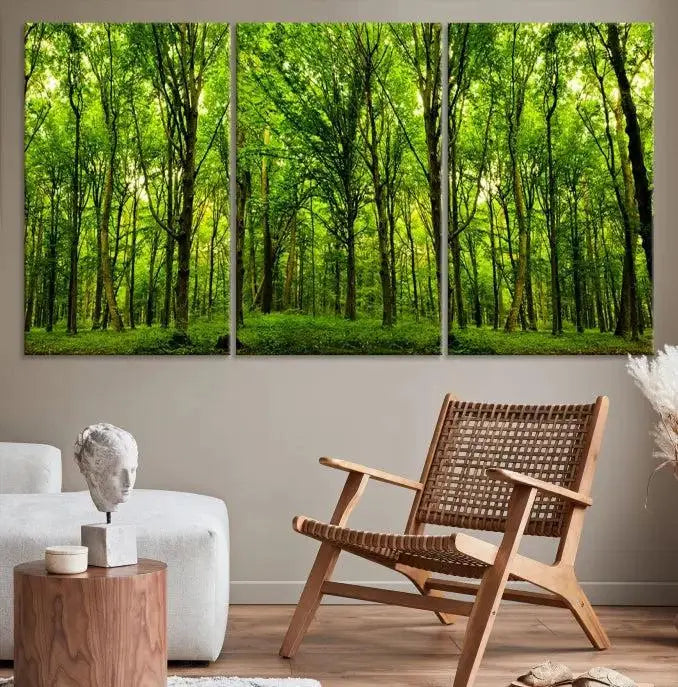 A modern living room features the Lush Green Forest Canvas Print—a 3-panel forest wall art—mounted above, creating an ideal retreat for nature lovers.