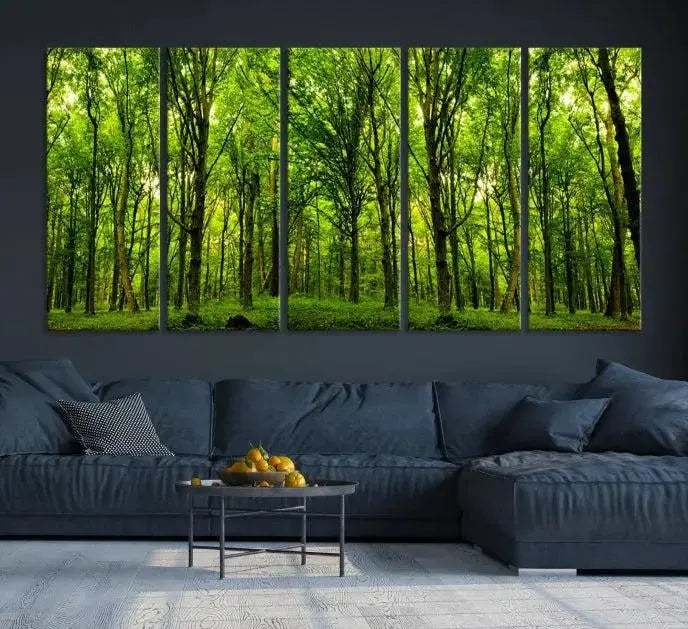 A modern living room features the Lush Green Forest Canvas Print—a 3-panel forest wall art—mounted above, creating an ideal retreat for nature lovers.