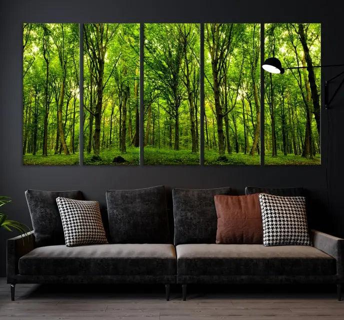 A modern living room features the Lush Green Forest Canvas Print—a 3-panel forest wall art—mounted above, creating an ideal retreat for nature lovers.