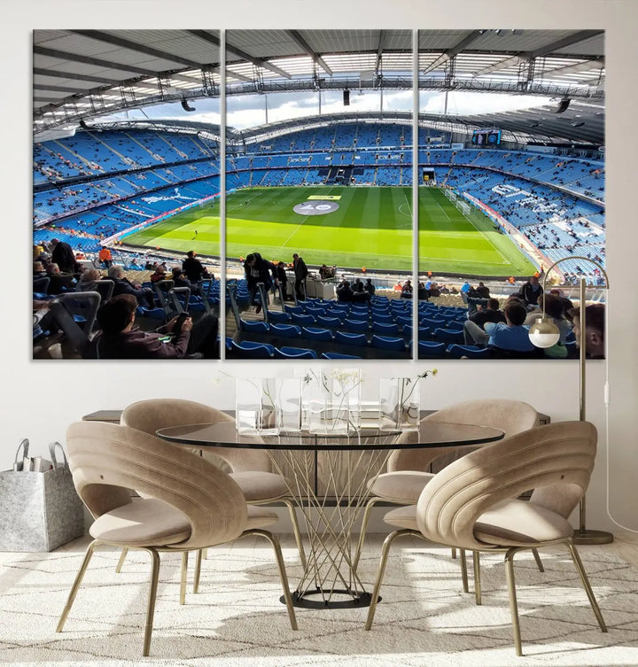 A captivating Manchester City Etihad Stadium Wall Art Canvas Print graces the living room, showcasing a football stadium with an empty field in a gallery-quality finish.