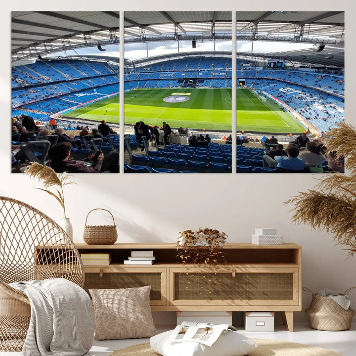 A captivating Manchester City Etihad Stadium Wall Art Canvas Print graces the living room, showcasing a football stadium with an empty field in a gallery-quality finish.