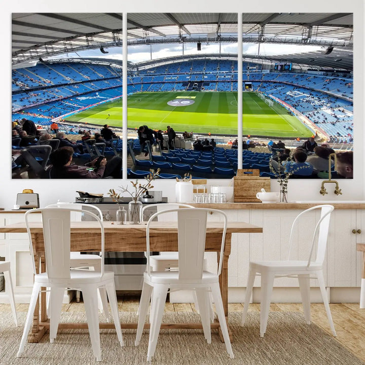 A captivating Manchester City Etihad Stadium Wall Art Canvas Print graces the living room, showcasing a football stadium with an empty field in a gallery-quality finish.