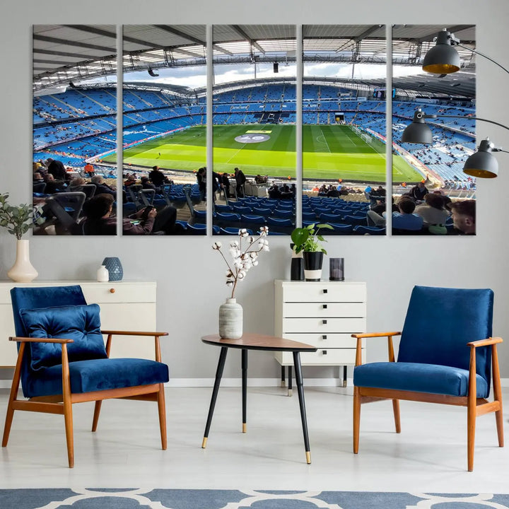 A captivating Manchester City Etihad Stadium Wall Art Canvas Print graces the living room, showcasing a football stadium with an empty field in a gallery-quality finish.