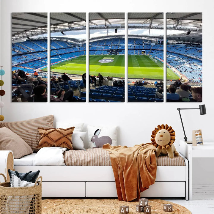 A captivating Manchester City Etihad Stadium Wall Art Canvas Print graces the living room, showcasing a football stadium with an empty field in a gallery-quality finish.