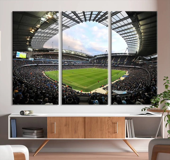 A panoramic view of Manchester City's Etihad Stadium during a football match is captured in this premium canvas art. This striking triptych wall decor, named the "Manchester City Etihad Stadium Wall Art Canvas Print - Premier League Football Stadium," adds an elegant touch to any room.