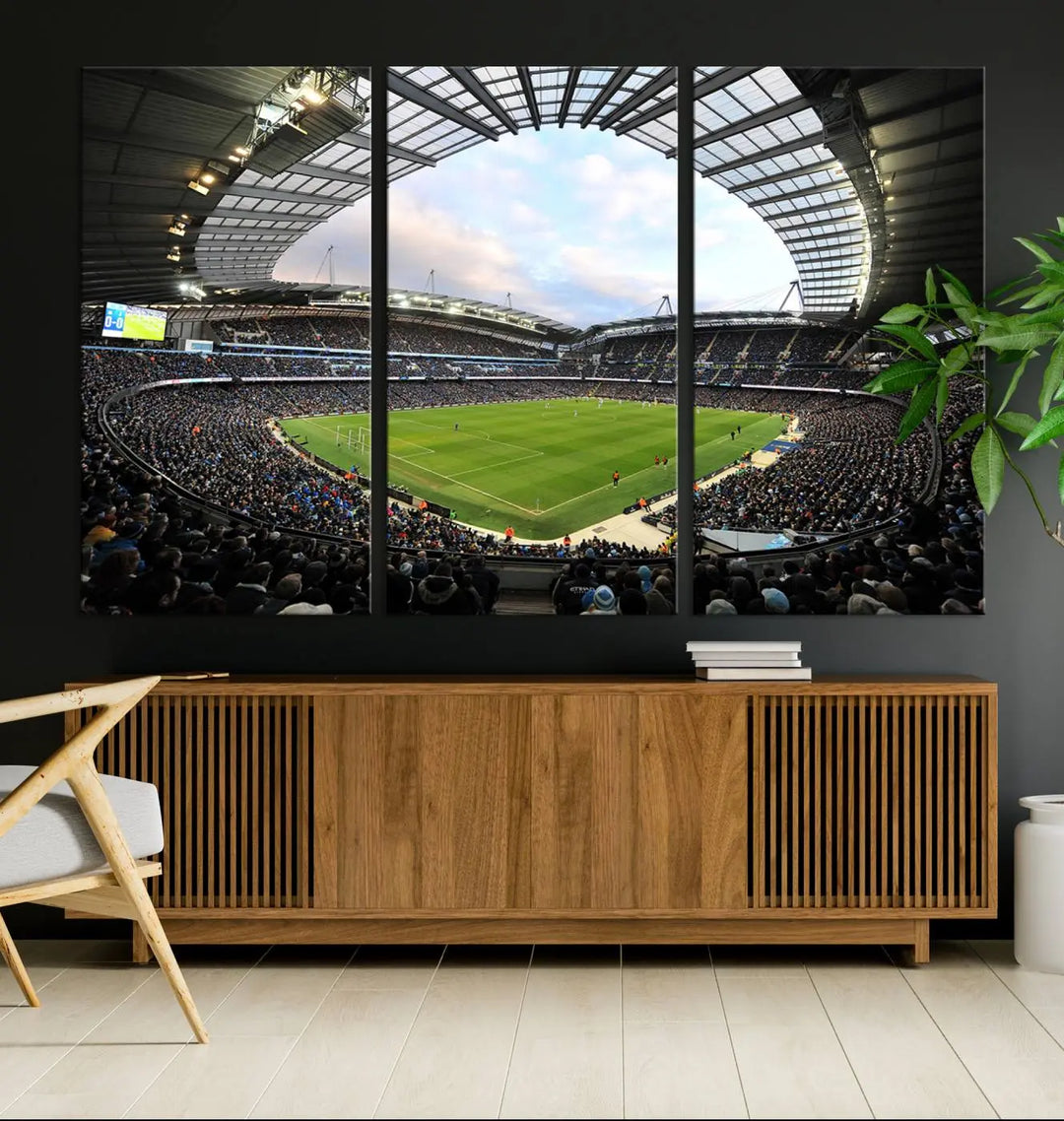 A panoramic view of Manchester City's Etihad Stadium during a football match is captured in this premium canvas art. This striking triptych wall decor, named the "Manchester City Etihad Stadium Wall Art Canvas Print - Premier League Football Stadium," adds an elegant touch to any room.