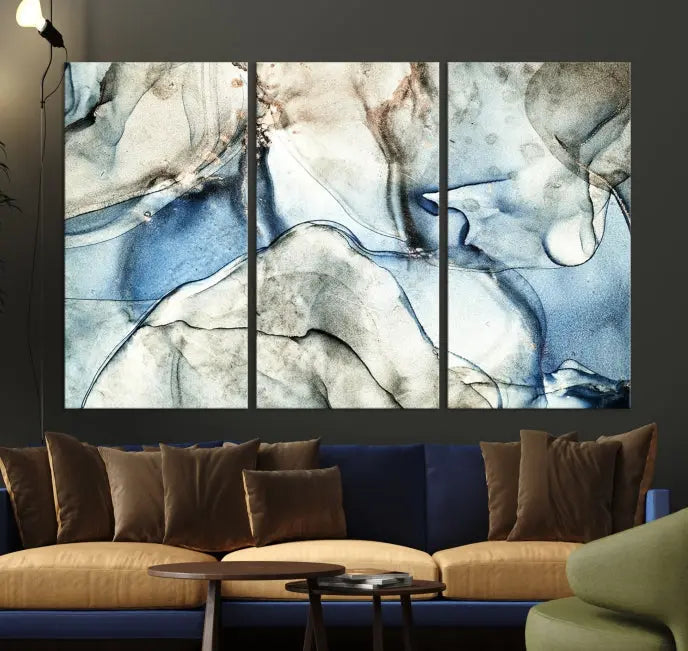 Introducing the Marble Fluid Effect Wall Art Abstract Canvas Wall Art Print, featuring a stunning triptych design with blue and beige swirls on museum-quality canvas.