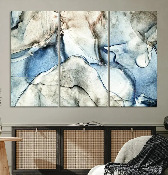 Introducing the Marble Fluid Effect Wall Art Abstract Canvas Wall Art Print, featuring a stunning triptych design with blue and beige swirls on museum-quality canvas.