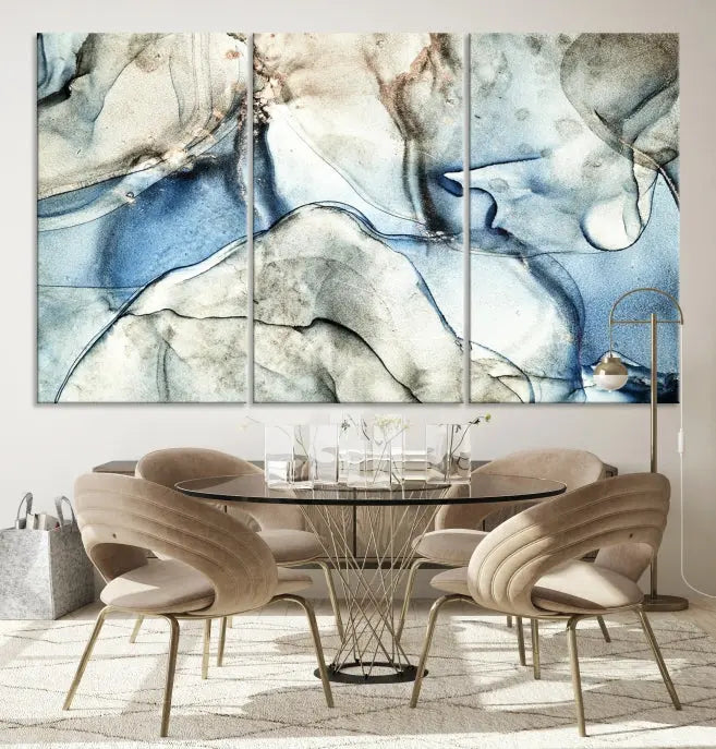 Introducing the Marble Fluid Effect Wall Art Abstract Canvas Wall Art Print, featuring a stunning triptych design with blue and beige swirls on museum-quality canvas.