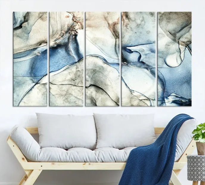 Introducing the Marble Fluid Effect Wall Art Abstract Canvas Wall Art Print, featuring a stunning triptych design with blue and beige swirls on museum-quality canvas.