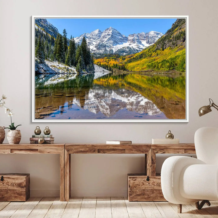 The Maroon Bells Canvas Print showcases Aspen Colorados snow-capped peaks and serene Maroon Lake.