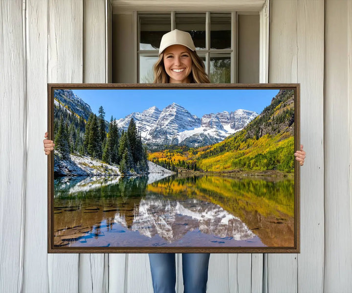 The Maroon Bells Canvas Print showcases Aspen Colorados snow-capped peaks and serene Maroon Lake.