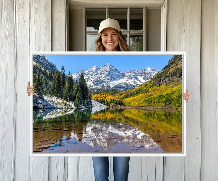 The Maroon Bells Canvas Print showcases Aspen Colorados snow-capped peaks and serene Maroon Lake.