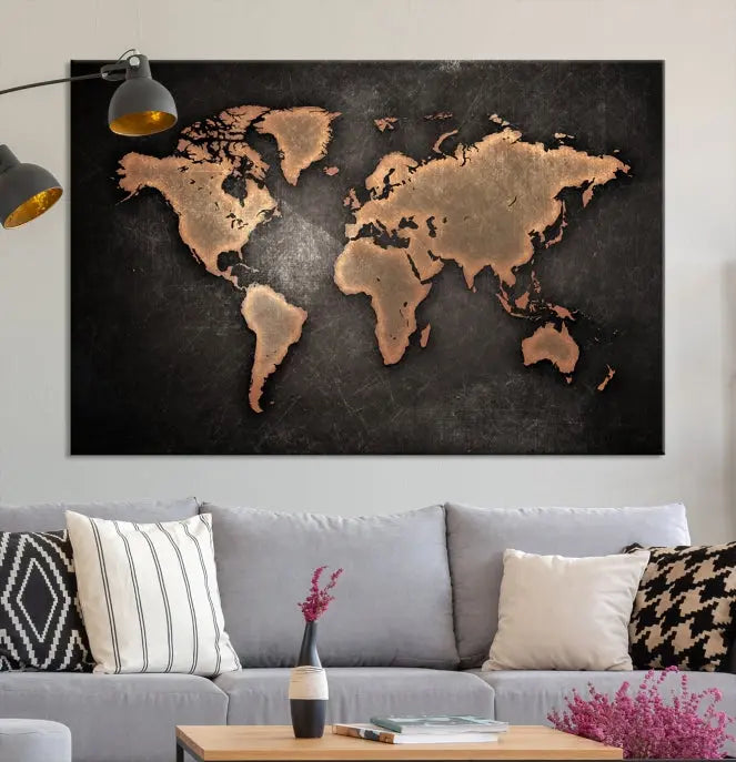 The Maroon World Map Wall Art Canvas Print, comprising three panels, showcases a golden world map on a dark background. Crafted on museum-quality canvas with a UV-protective coating, it arrives ready to hang and adds an elegant touch to any space.