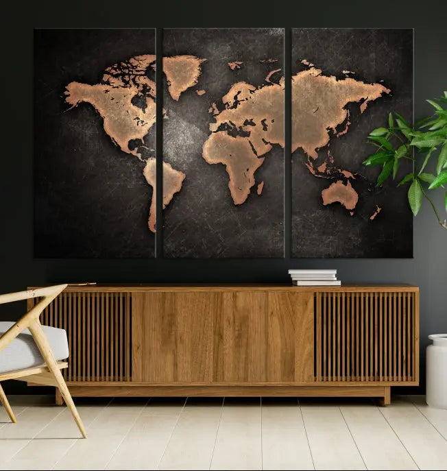 The Maroon World Map Wall Art Canvas Print, comprising three panels, showcases a golden world map on a dark background. Crafted on museum-quality canvas with a UV-protective coating, it arrives ready to hang and adds an elegant touch to any space.