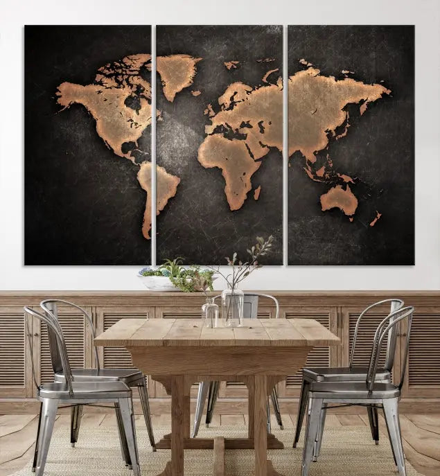 The Maroon World Map Wall Art Canvas Print, comprising three panels, showcases a golden world map on a dark background. Crafted on museum-quality canvas with a UV-protective coating, it arrives ready to hang and adds an elegant touch to any space.