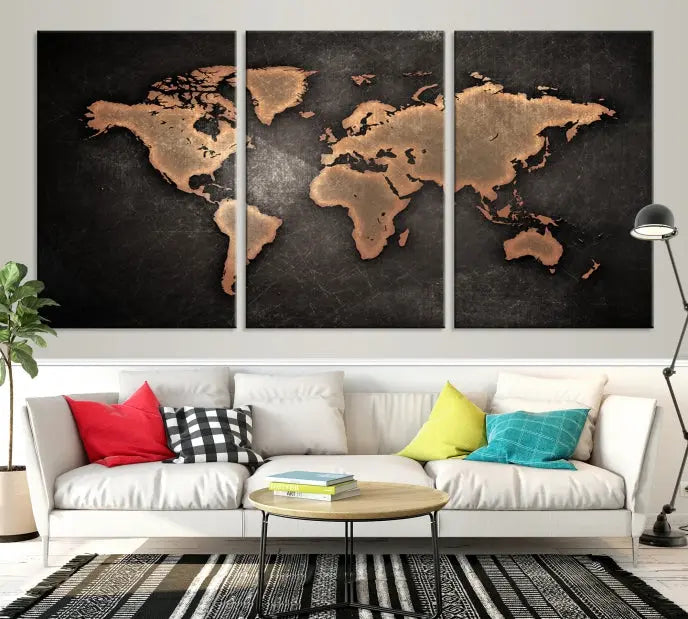 The Maroon World Map Wall Art Canvas Print, comprising three panels, showcases a golden world map on a dark background. Crafted on museum-quality canvas with a UV-protective coating, it arrives ready to hang and adds an elegant touch to any space.