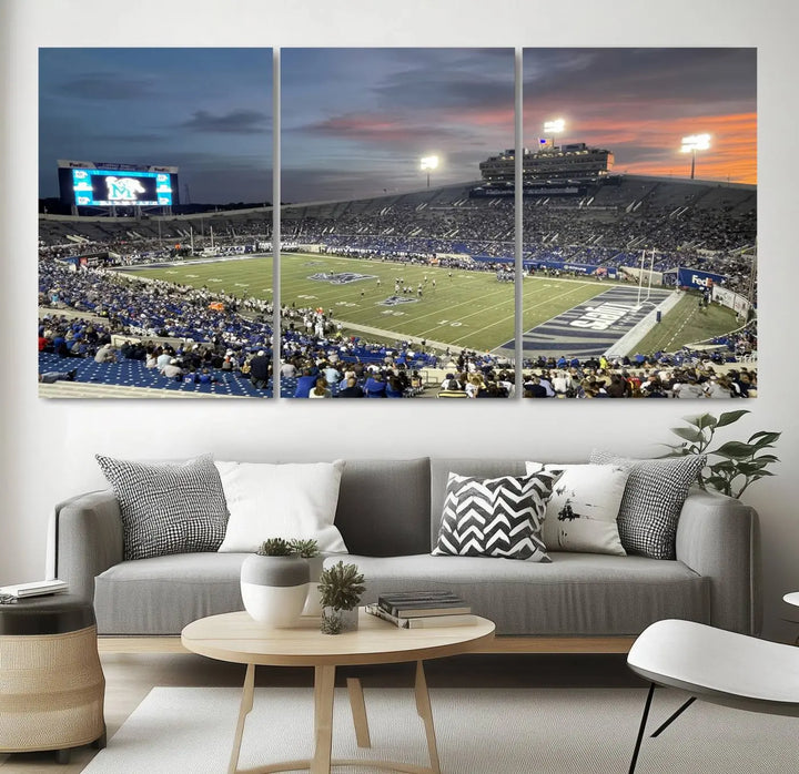 The "Memphis Tigers Football Team Print" is a triptych canvas, printed in high-resolution with vibrant colors, spotlighting the Memphis Simmons Bank Liberty Stadium at sunset. The scene beautifully captures a thrilling game in progress and the lively crowd, all rendered on museum quality canvas.