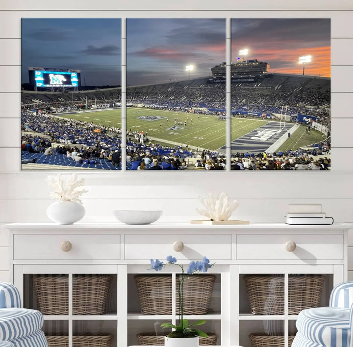 The "Memphis Tigers Football Team Print" is a triptych canvas, printed in high-resolution with vibrant colors, spotlighting the Memphis Simmons Bank Liberty Stadium at sunset. The scene beautifully captures a thrilling game in progress and the lively crowd, all rendered on museum quality canvas.