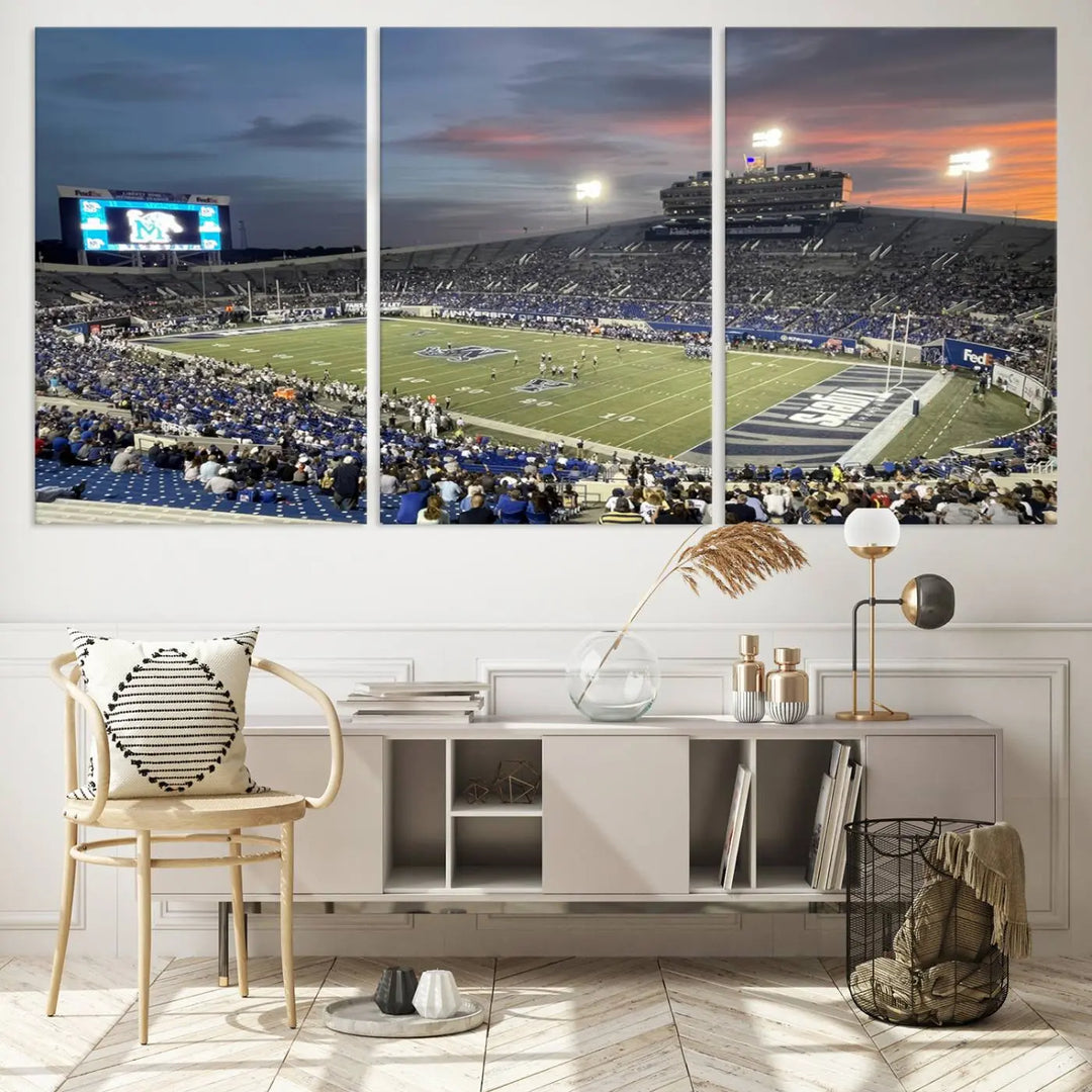 The "Memphis Tigers Football Team Print" is a triptych canvas, printed in high-resolution with vibrant colors, spotlighting the Memphis Simmons Bank Liberty Stadium at sunset. The scene beautifully captures a thrilling game in progress and the lively crowd, all rendered on museum quality canvas.