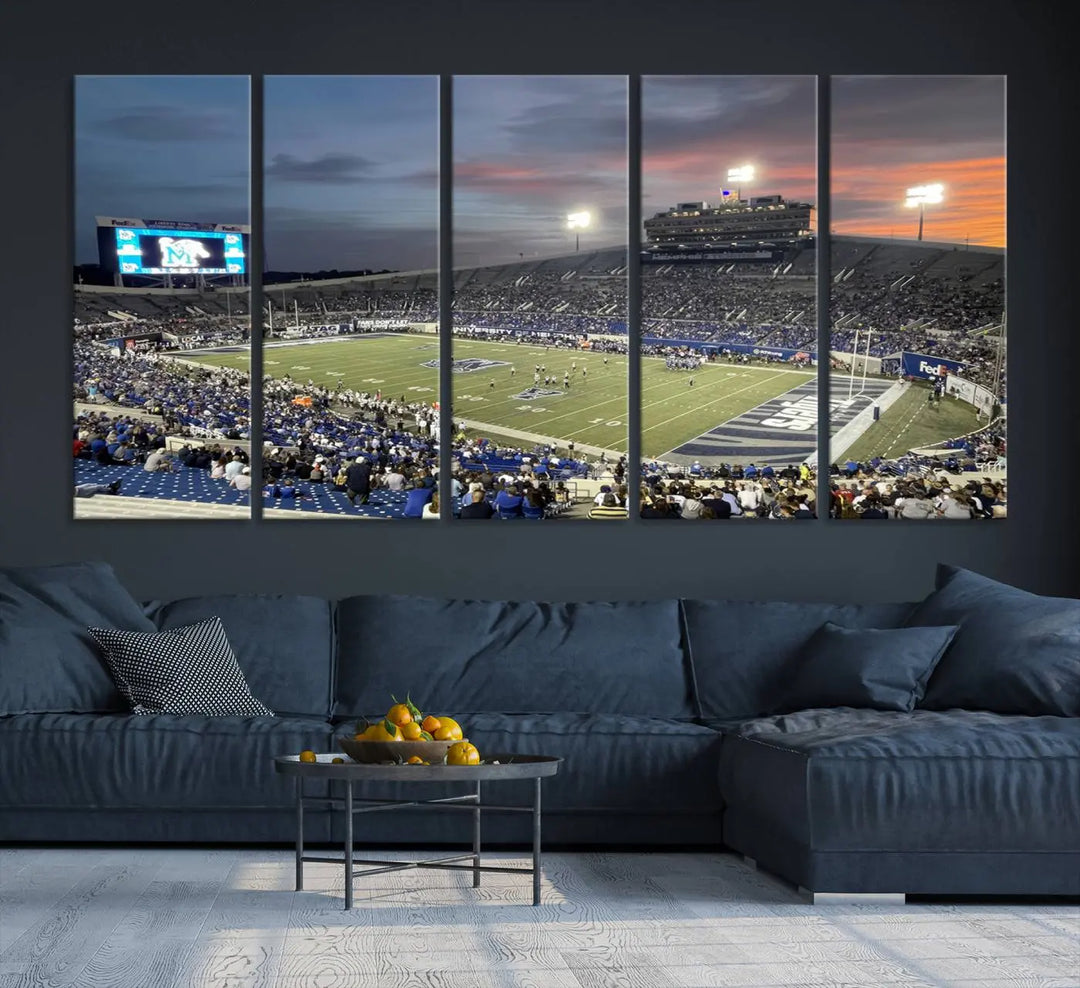 The "Memphis Tigers Football Team Print" is a triptych canvas, printed in high-resolution with vibrant colors, spotlighting the Memphis Simmons Bank Liberty Stadium at sunset. The scene beautifully captures a thrilling game in progress and the lively crowd, all rendered on museum quality canvas.