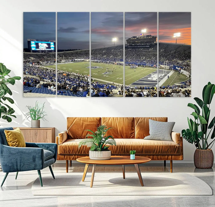 The "Memphis Tigers Football Team Print" is a triptych canvas, printed in high-resolution with vibrant colors, spotlighting the Memphis Simmons Bank Liberty Stadium at sunset. The scene beautifully captures a thrilling game in progress and the lively crowd, all rendered on museum quality canvas.