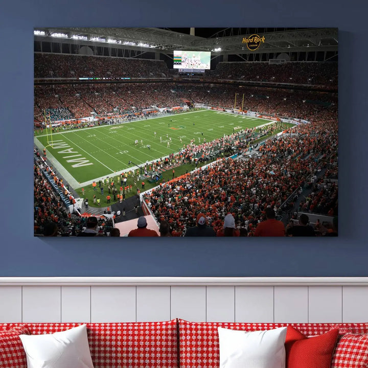 The Miami Hurricanes Football Team Print, showcasing the energetic Miami Hard Rock Stadium filled with fans, is a premium canvas print that offers a gallery-quality finish, ideal for enhancing your space.