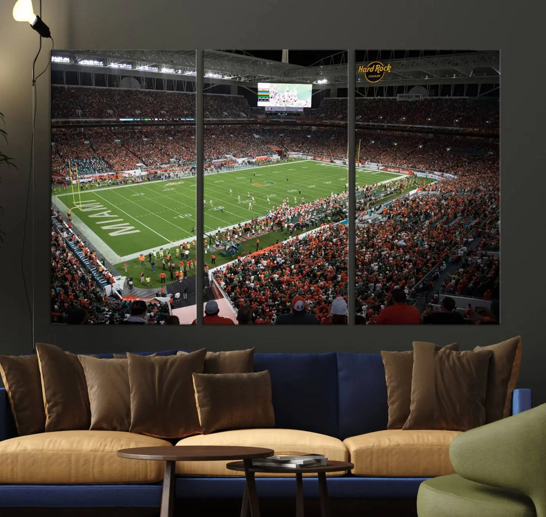 The Miami Hurricanes Football Team Print, showcasing the energetic Miami Hard Rock Stadium filled with fans, is a premium canvas print that offers a gallery-quality finish, ideal for enhancing your space.