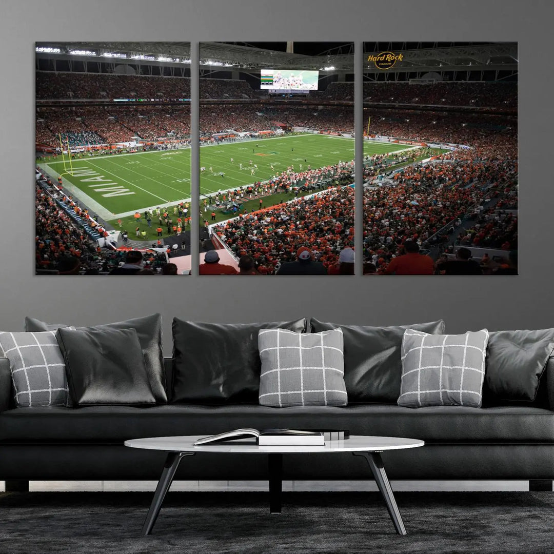 The Miami Hurricanes Football Team Print, showcasing the energetic Miami Hard Rock Stadium filled with fans, is a premium canvas print that offers a gallery-quality finish, ideal for enhancing your space.