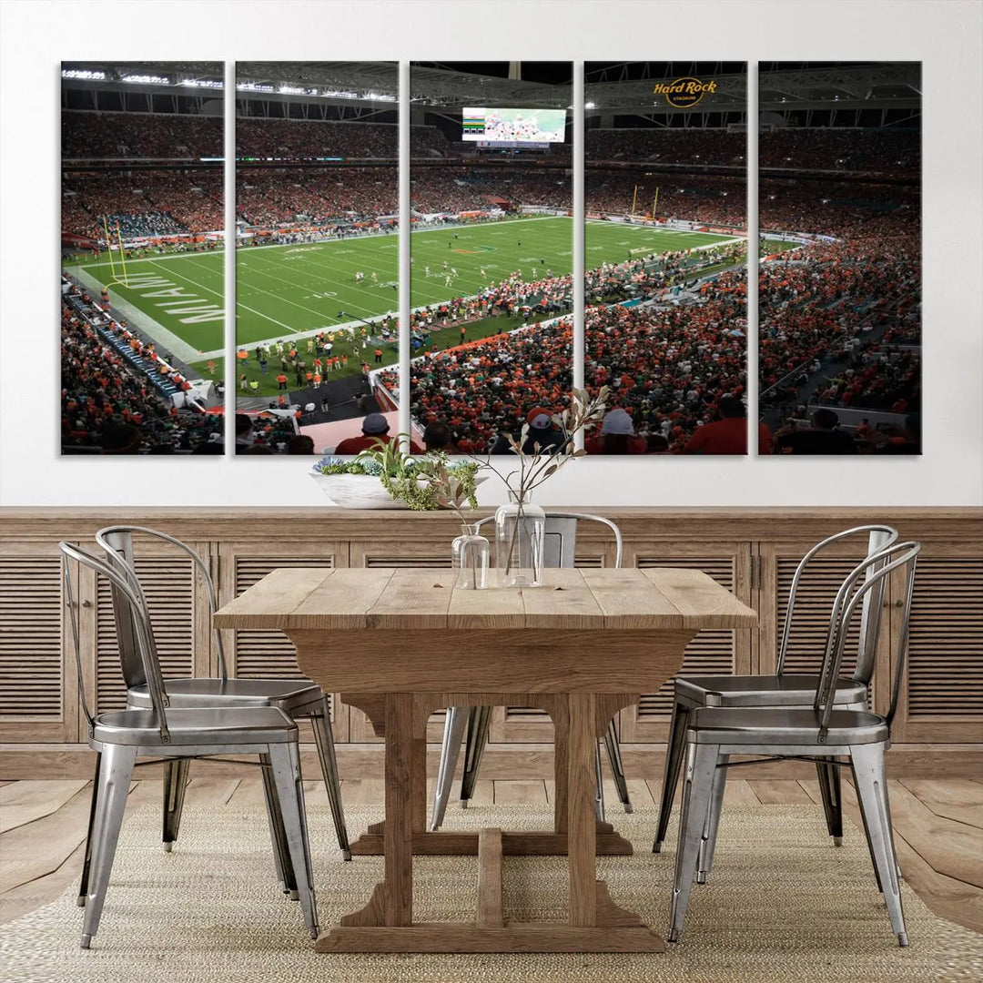 The Miami Hurricanes Football Team Print, showcasing the energetic Miami Hard Rock Stadium filled with fans, is a premium canvas print that offers a gallery-quality finish, ideal for enhancing your space.