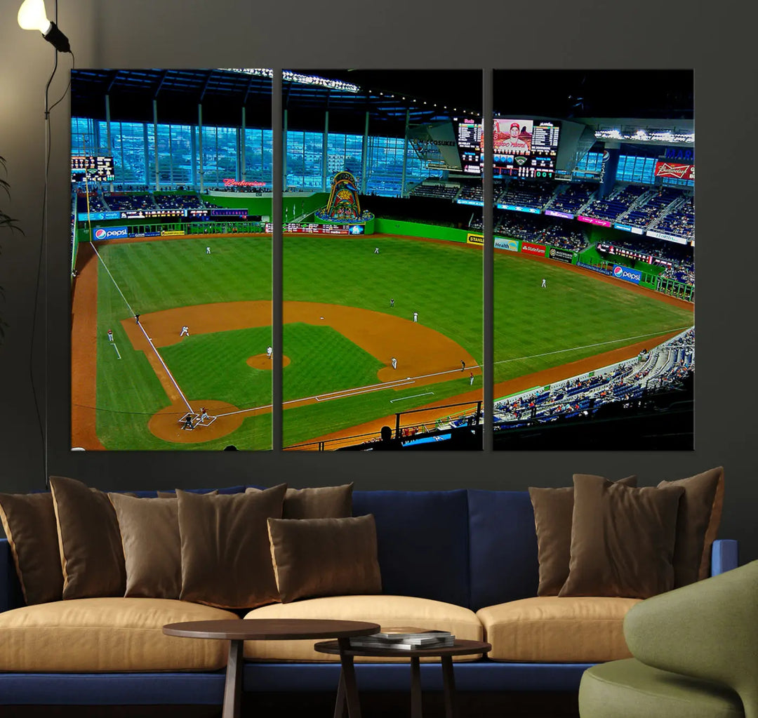 A striking three-panel Miami Marlins wall art of the LoanDepot Park stadium hangs above, enhancing the space with its premium canvas and gallery-quality finish.