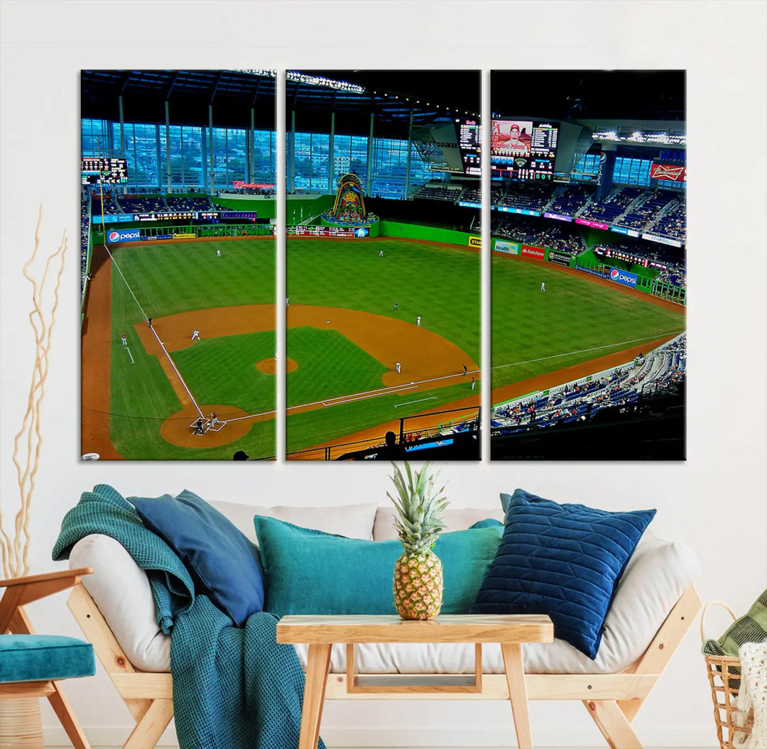 A striking three-panel Miami Marlins wall art of the LoanDepot Park stadium hangs above, enhancing the space with its premium canvas and gallery-quality finish.