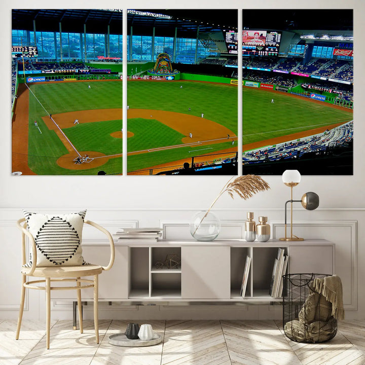 A striking three-panel Miami Marlins wall art of the LoanDepot Park stadium hangs above, enhancing the space with its premium canvas and gallery-quality finish.