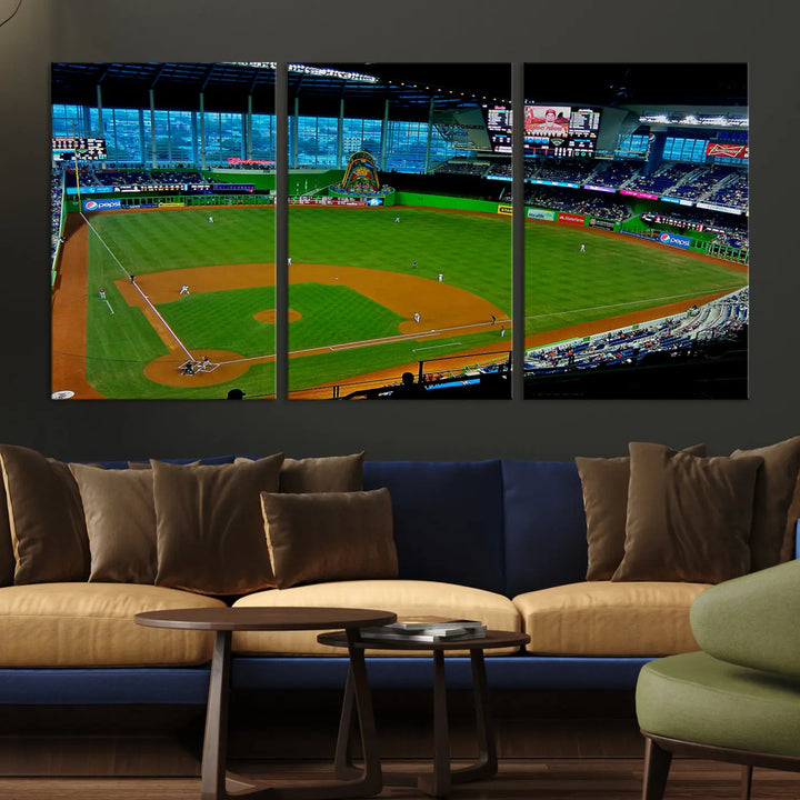 A striking three-panel Miami Marlins wall art of the LoanDepot Park stadium hangs above, enhancing the space with its premium canvas and gallery-quality finish.