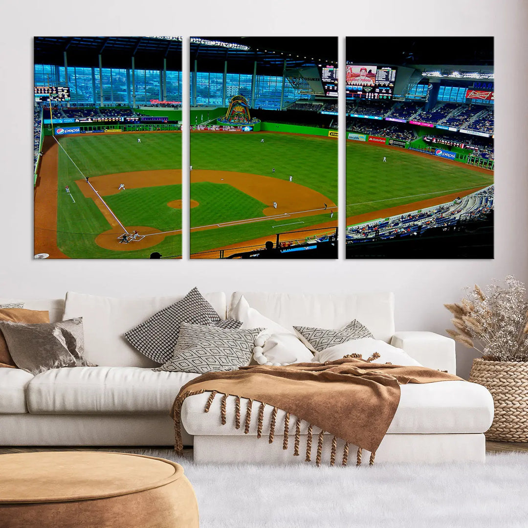 A striking three-panel Miami Marlins wall art of the LoanDepot Park stadium hangs above, enhancing the space with its premium canvas and gallery-quality finish.