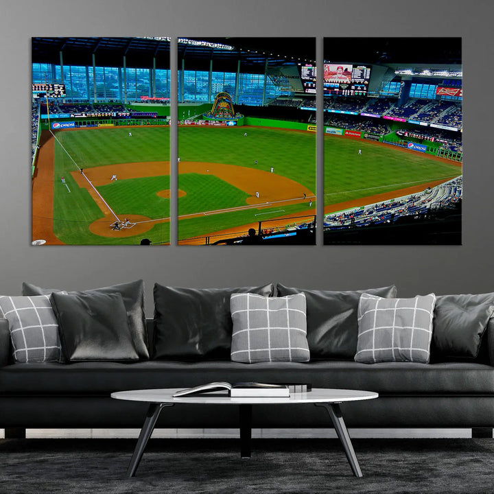 A striking three-panel Miami Marlins wall art of the LoanDepot Park stadium hangs above, enhancing the space with its premium canvas and gallery-quality finish.